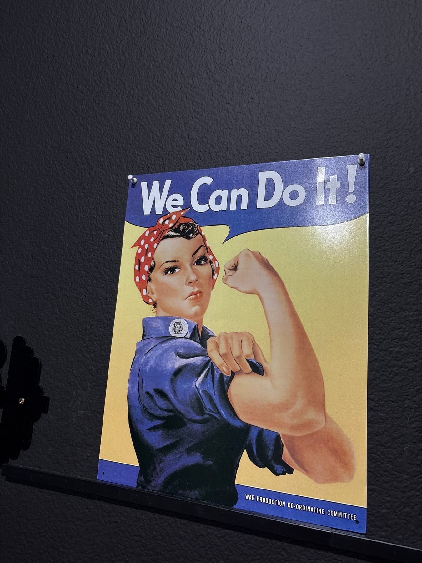 We Can Do It poster displayed inside StrongHER Gym